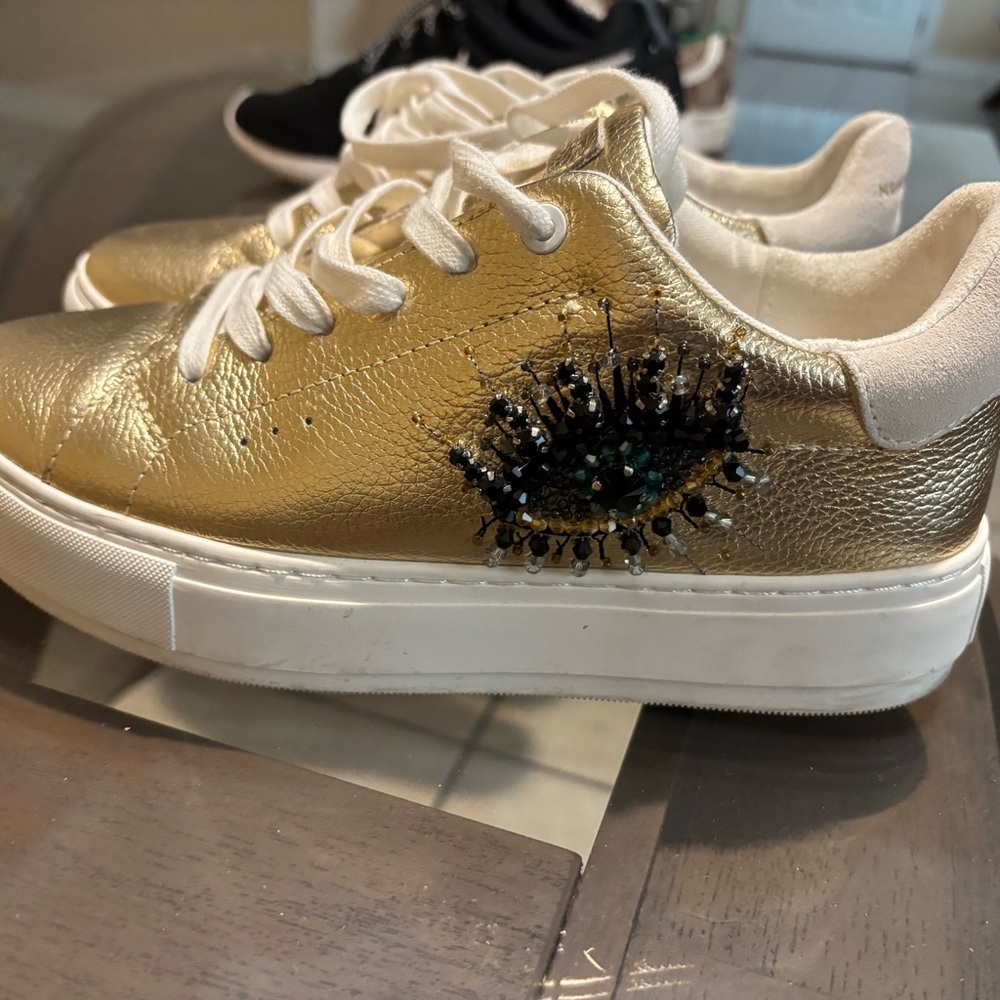 Kurt Geiger Gold Sneakers with Eye Detail